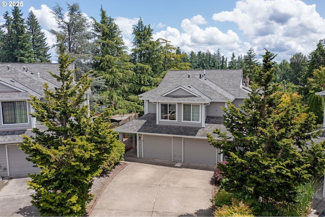 2038 Titan Ter, West Linn, OR 97068 - view of front of property with an attached garage, concrete driveway, and a shingled roof