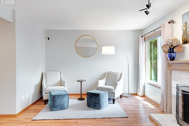 2038 Titan Ter, West Linn, OR 97068 - living area featuring a tile fireplace and wood finished floors