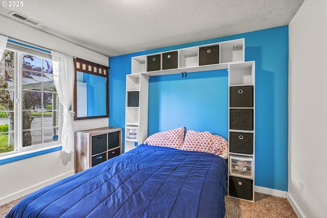 112 Stoneway Ln, Longview, WA 98632 - bedroom with carpet, a textured ceiling, and baseboards