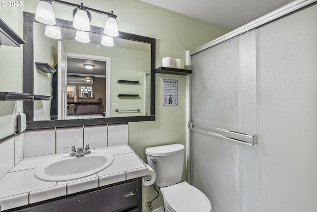 112 Stoneway Ln, Longview, WA 98632 - bathroom with a shower stall, vanity, and toilet