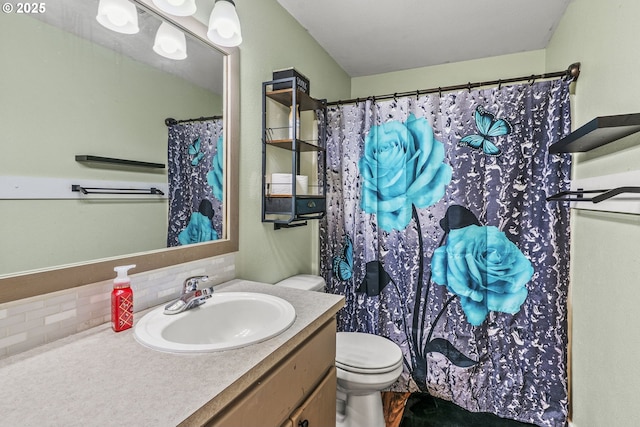 112 Stoneway Ln, Longview, WA 98632 - full bath featuring backsplash, toilet, vanity, and a shower with curtain
