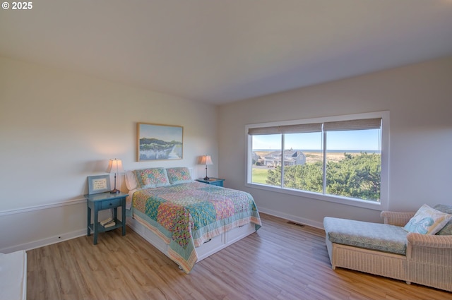 bedroom featuring light hardwood / wood-style flooring