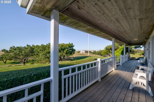 wooden terrace featuring a porch