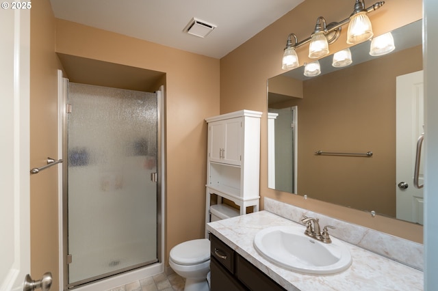 full bathroom featuring vanity, a shower stall, toilet, and visible vents