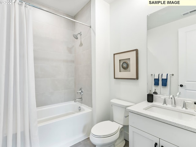 full bathroom with vanity, shower / bath combination with curtain, and toilet