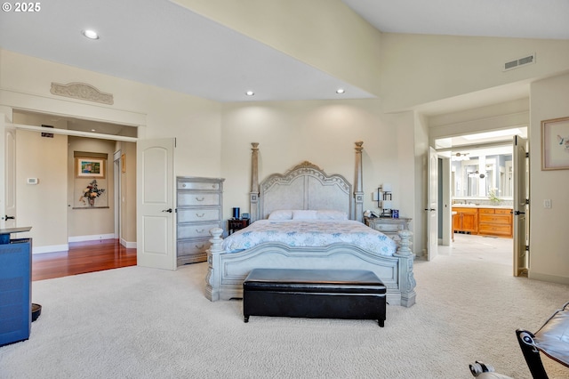 bedroom with recessed lighting, visible vents, light colored carpet, and lofted ceiling