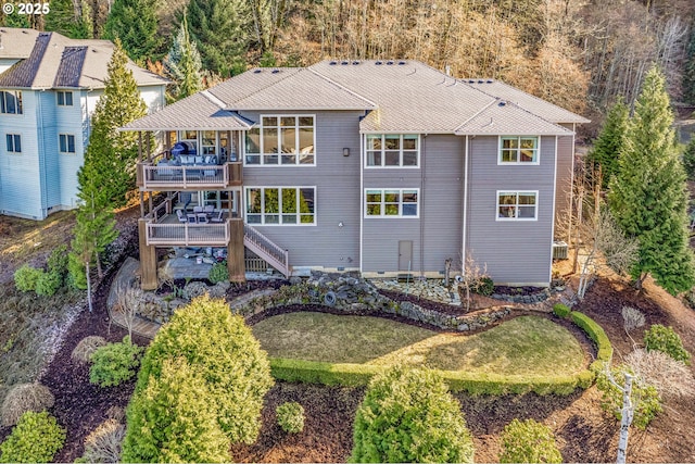 rear view of property featuring a deck, stairs, and central AC