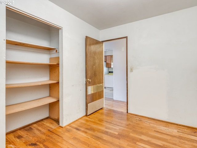660 Barton Ave, Gladstone, OR 97027 - unfurnished bedroom with wood finished floors and a closet