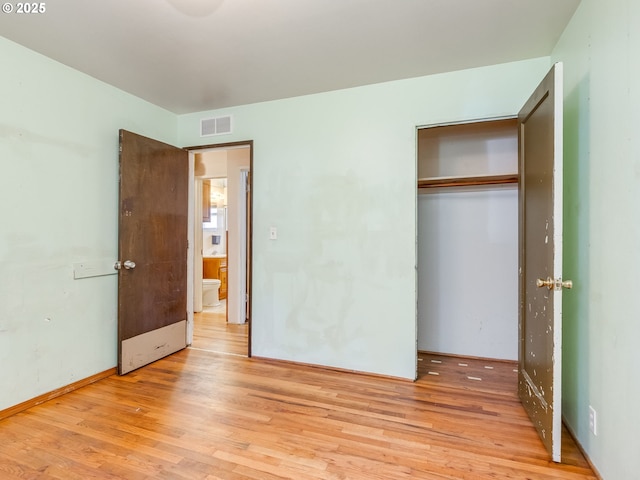660 Barton Ave, Gladstone, OR 97027 - unfurnished bedroom with light wood-style floors and a closet