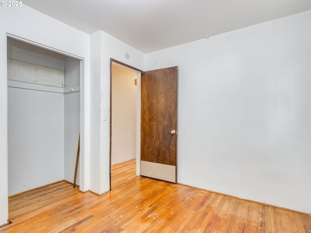 660 Barton Ave, Gladstone, OR 97027 - unfurnished bedroom with wood finished floors and a closet