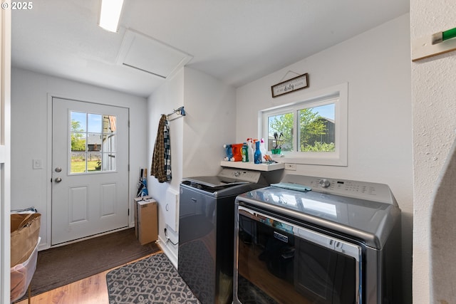 540 Kesling St, Harrisburg, OR 97446 - washroom with separate washer and dryer, attic access, and wood finished floors