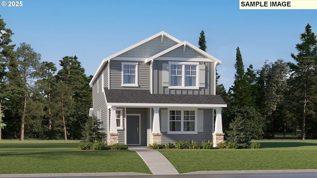 craftsman house with a shingled roof and a front yard