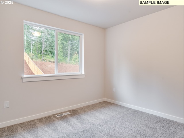 view of carpeted empty room