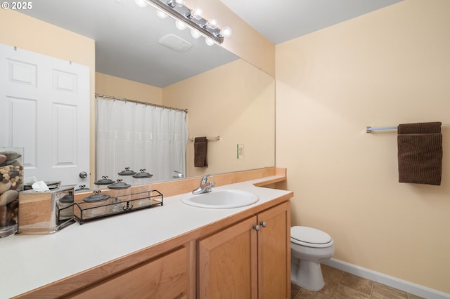 full bath with vanity, a shower with shower curtain, baseboards, tile patterned floors, and toilet