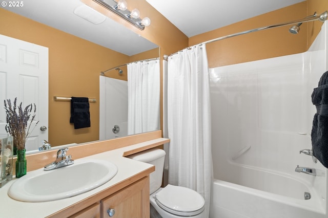 full bathroom with toilet, shower / bath combo with shower curtain, and vanity