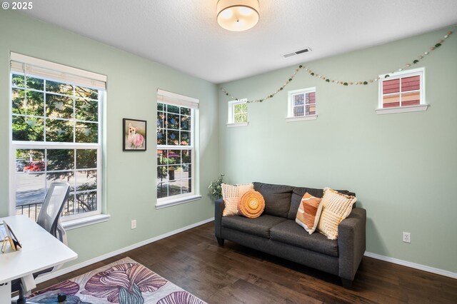 842 NE Rothbury Ave, Hillsboro, OR 97124 - office space featuring baseboards, wood finished floors, and visible vents