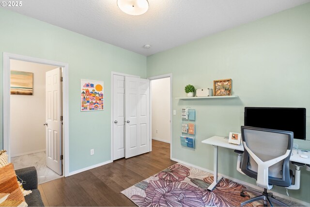 842 NE Rothbury Ave, Hillsboro, OR 97124 - office area with baseboards and wood finished floors