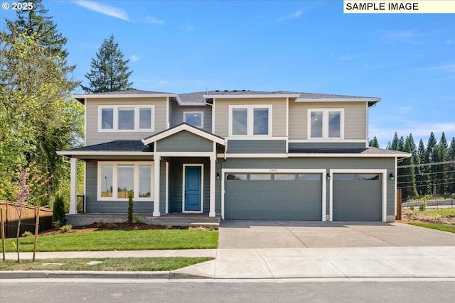 view of front of property with a garage