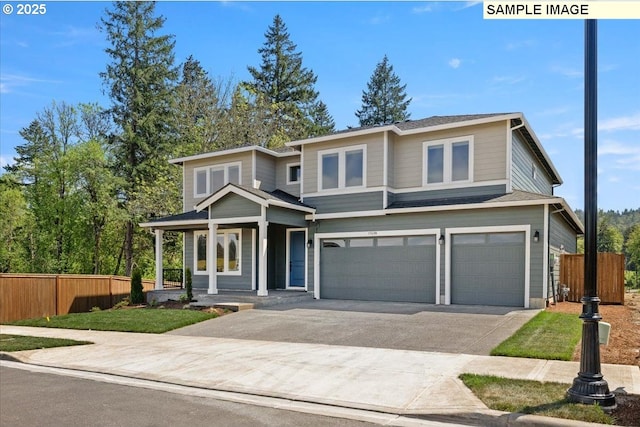 view of front of property with a porch and a garage