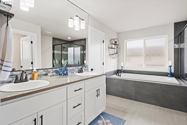 bathroom featuring plus walk in shower and vanity
