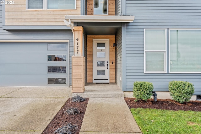 property entrance with a garage