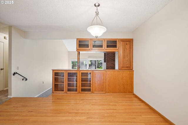 1200 NE Territorial Rd Unit 83, Canby, OR 97013 - unfurnished room featuring light wood-type flooring, a textured ceiling, and baseboards