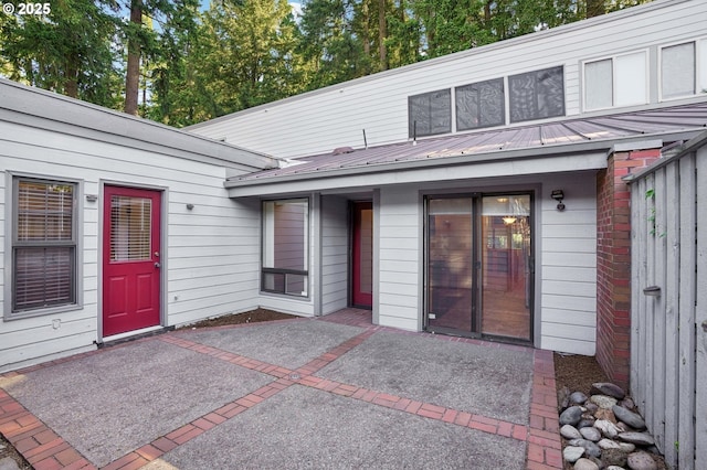 1200 NE Territorial Rd Unit 83, Canby, OR 97013 - back of house featuring a patio area and metal roof