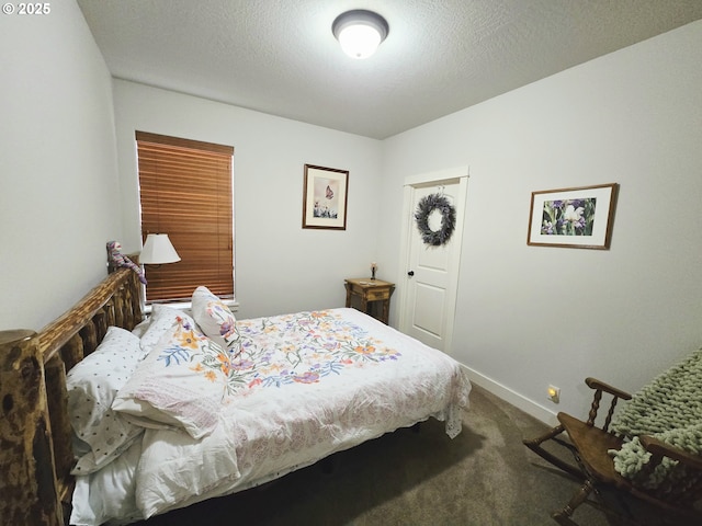 carpeted bedroom with baseboards
