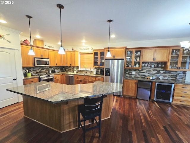 kitchen with stainless steel appliances, beverage cooler, brown cabinetry, decorative backsplash, and crown molding