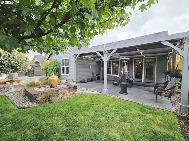 rear view of property featuring a patio area