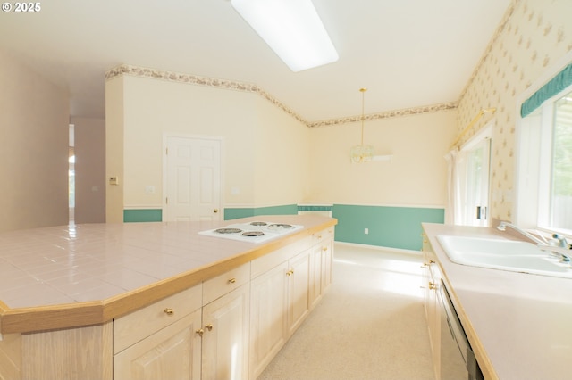 4020 NW Princess St, Corvallis, OR 97330 - kitchen featuring white appliances, tile counters, light colored carpet, and hanging light fixtures