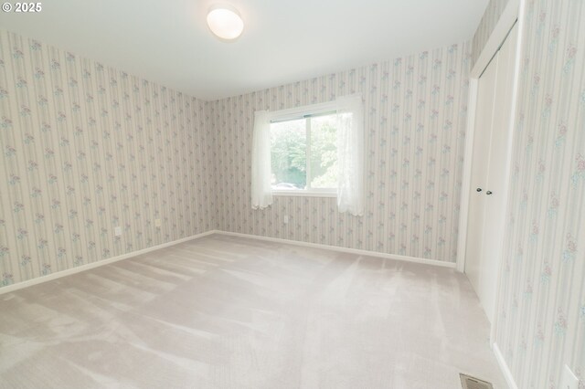 4020 NW Princess St, Corvallis, OR 97330 - unfurnished room featuring wallpapered walls and carpet
