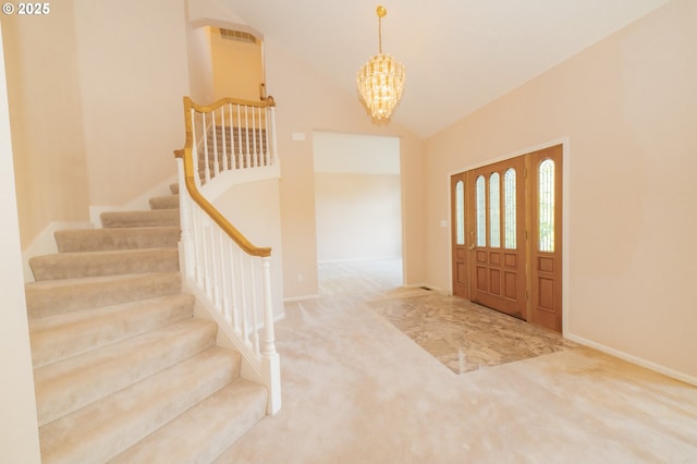 4020 NW Princess St, Corvallis, OR 97330 - carpeted entrance foyer featuring a chandelier, stairway, and vaulted ceiling