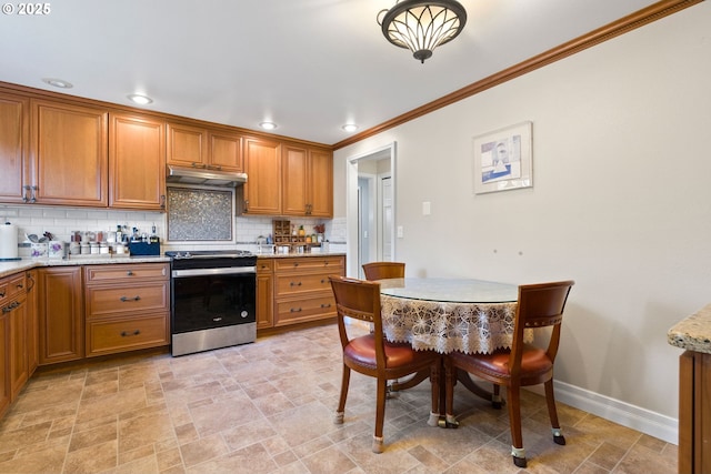 kitchen featuring stainless steel range with electric stovetop, ornamental molding, light stone countertops, and tasteful backsplash