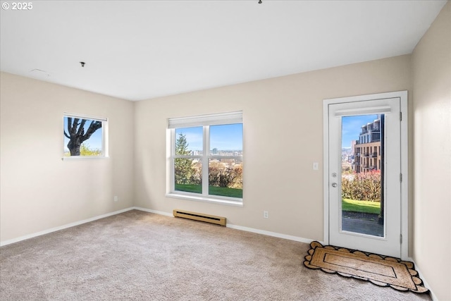310 NW Uptown Ter Unit 1A, Portland, OR 97210 - foyer with baseboard heating and carpet flooring
