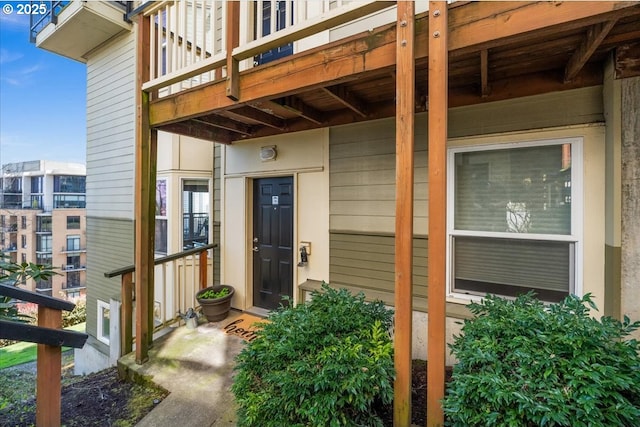 310 NW Uptown Ter Unit 1A, Portland, OR 97210 - view of exterior entry with a balcony