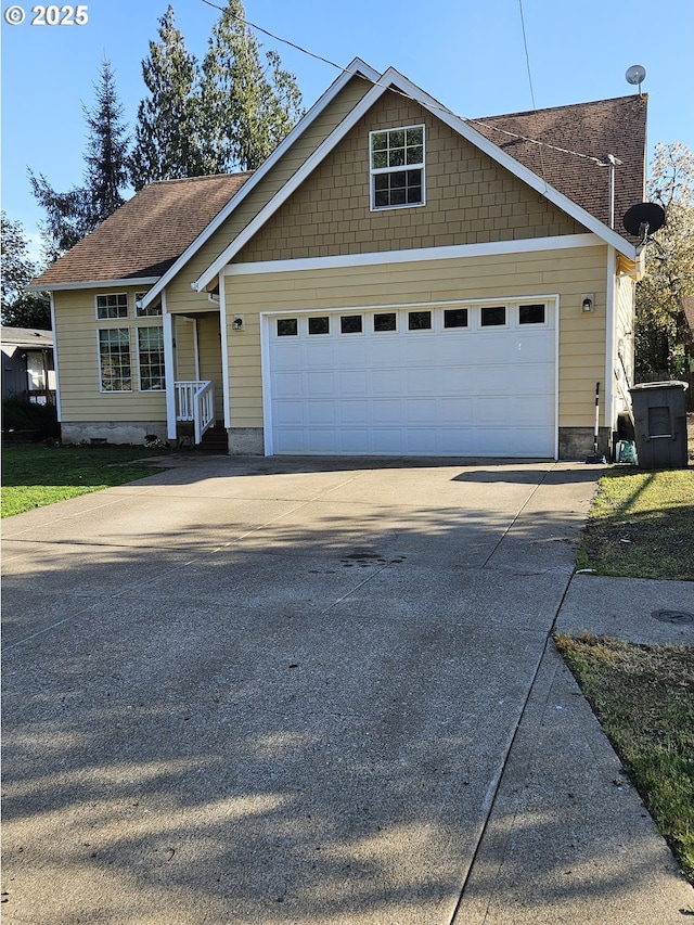 510 NE Yamhill St, Sheridan, OR 97378 - view of front of property featuring a shingled roof, driveway, and a garage