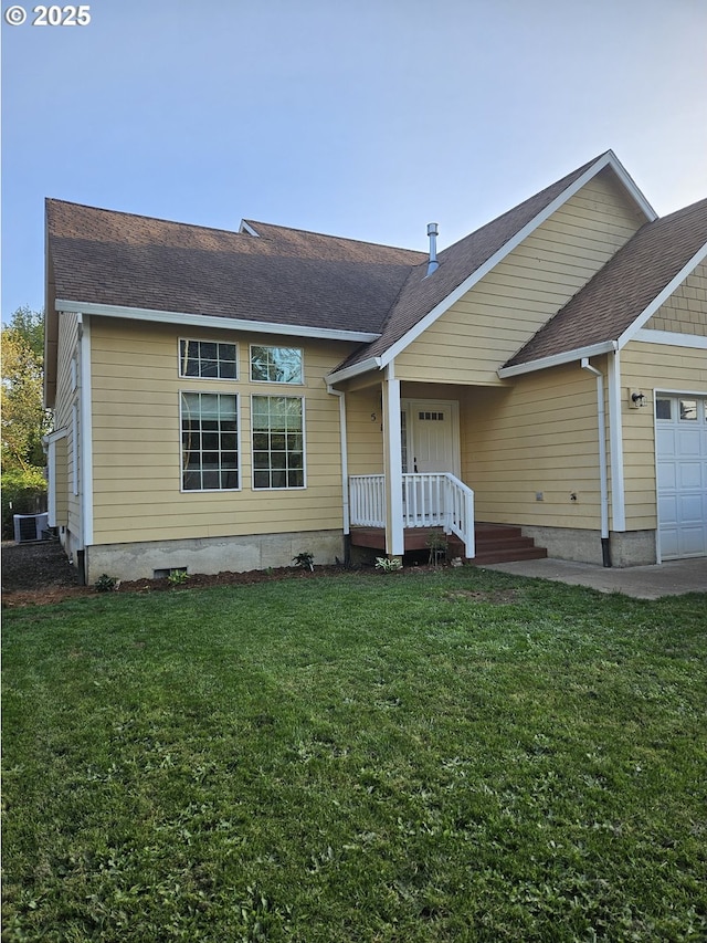 510 NE Yamhill St, Sheridan, OR 97378 - view of front of home with an attached garage, roof with shingles, and a front yard