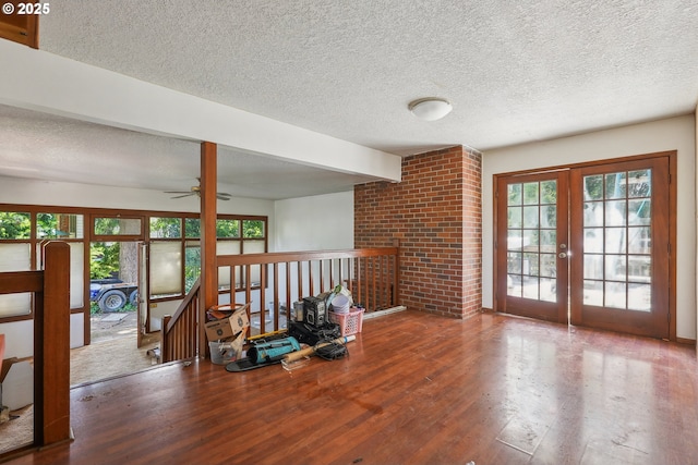 6395 SW 190th Ave, Beaverton, OR 97078 - spare room featuring wood finished floors, french doors, a textured ceiling, healthy amount of natural light, and ceiling fan