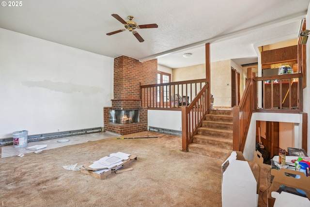 6395 SW 190th Ave, Beaverton, OR 97078 - unfurnished living room with a ceiling fan, carpet flooring, stairs, and a fireplace