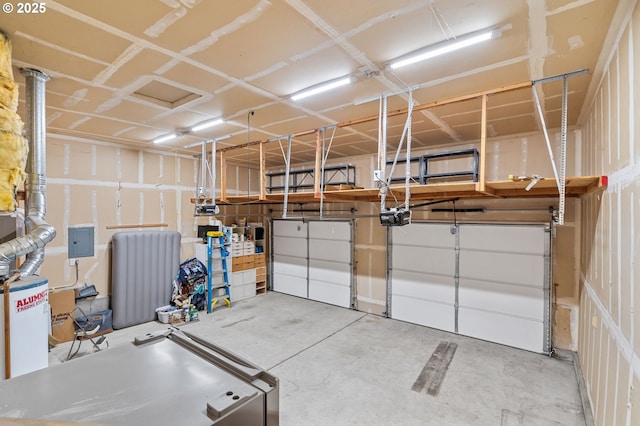 garage with a garage door opener, electric panel, and water heater