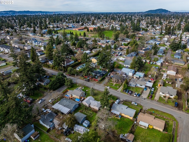 bird's eye view with a residential view and a mountain view