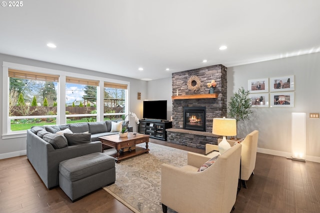 10603 NE 92nd Ave, Vancouver, WA 98662 - living area featuring baseboards, a stone fireplace, wood finished floors, and recessed lighting
