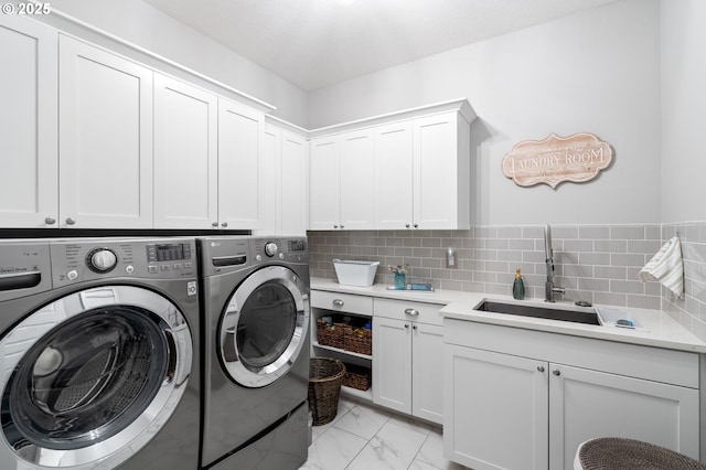10603 NE 92nd Ave, Vancouver, WA 98662 - laundry room with cabinet space, washer and dryer, and light marble finish floors