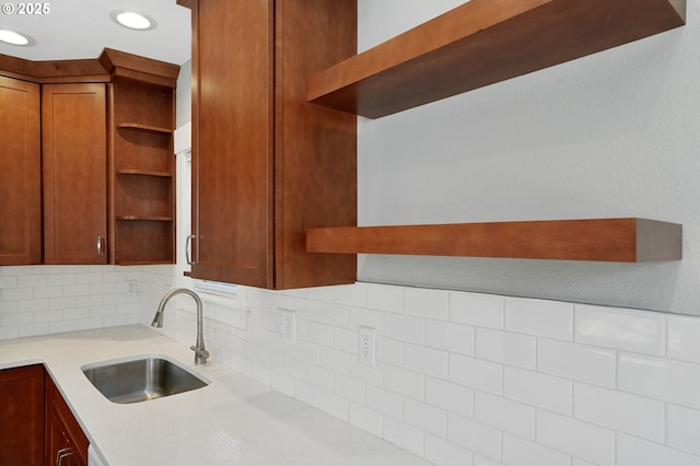220 Adams Ave, Silverton, OR 97381 - kitchen featuring open shelves, a sink, light countertops, and decorative backsplash