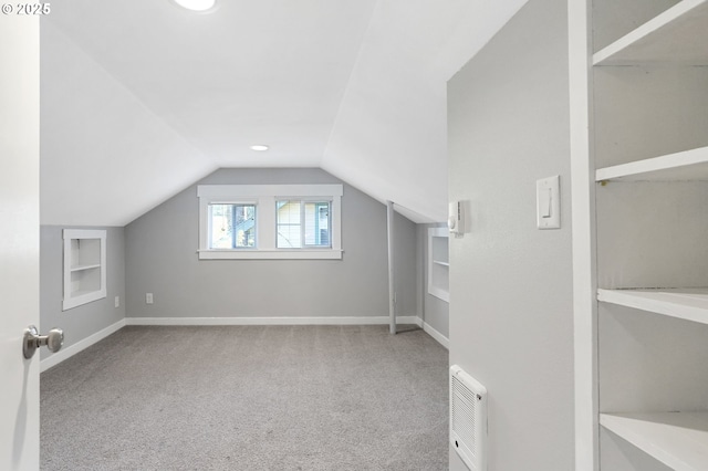 220 Adams Ave, Silverton, OR 97381 - additional living space featuring built in features, carpet, vaulted ceiling, baseboards, and recessed lighting