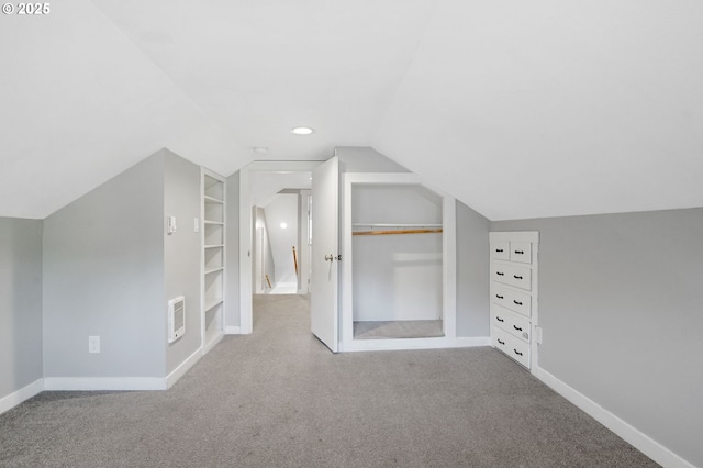 220 Adams Ave, Silverton, OR 97381 - bonus room with built in shelves, carpet floors, lofted ceiling, and baseboards