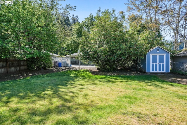 220 Adams Ave, Silverton, OR 97381 - view of yard with a shed and an outbuilding