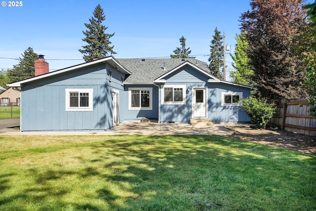 220 Adams Ave, Silverton, OR 97381 - back of house with a patio area, entry steps, a shingled roof, a chimney, and board and batten siding