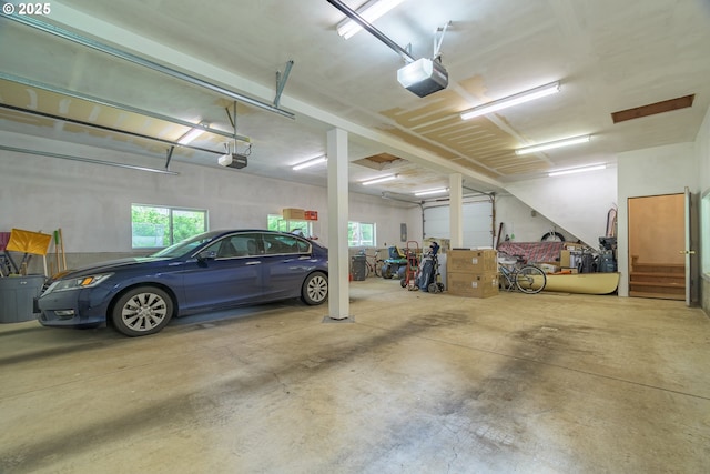 garage featuring a garage door opener